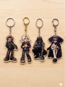 Acrylic keychain featuring Leon Kennedy, Grace Ashcroft, Victor Gideon, and (OTHER CHARACTERS MAY BE REVEALED)