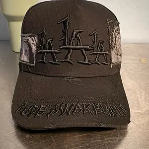 Rude Awakening The Messiah G5 Black Baseball Cap with Embroidered Design and Adjustable Strap
