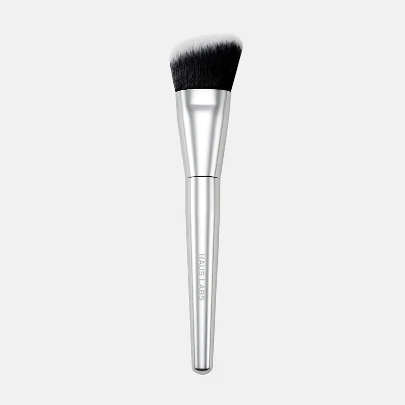 FOUNDATION BRUSH - A luxe, custom foundation brush designed to seamlessly build, buff and blend with control and ease.