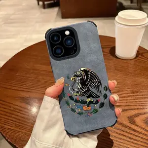 This premium leather phone case features a golden eagle emblem and flag design, providing full coverage for iPhone 17, Pro Max, Air 16, 15 Plus, 14, 13, and 12 models. It offers shock and drop protection with military-grade finish.