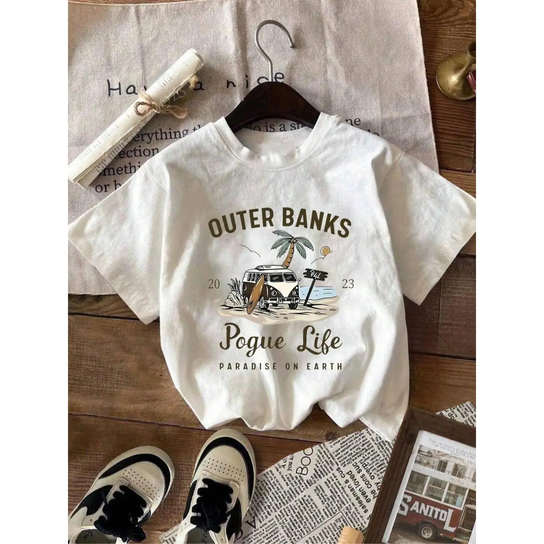 Outer Banks Pogue Life Paradise On Earth Graphic T-Shirt, Vintage Beach Van Surf Print Tee, [100% cotton] Shirt, Retro Coastal Vacation Style Short Sleeve Top, Boho Beachy Cotton Tee for OBX Fans and Summer Travel Outfits