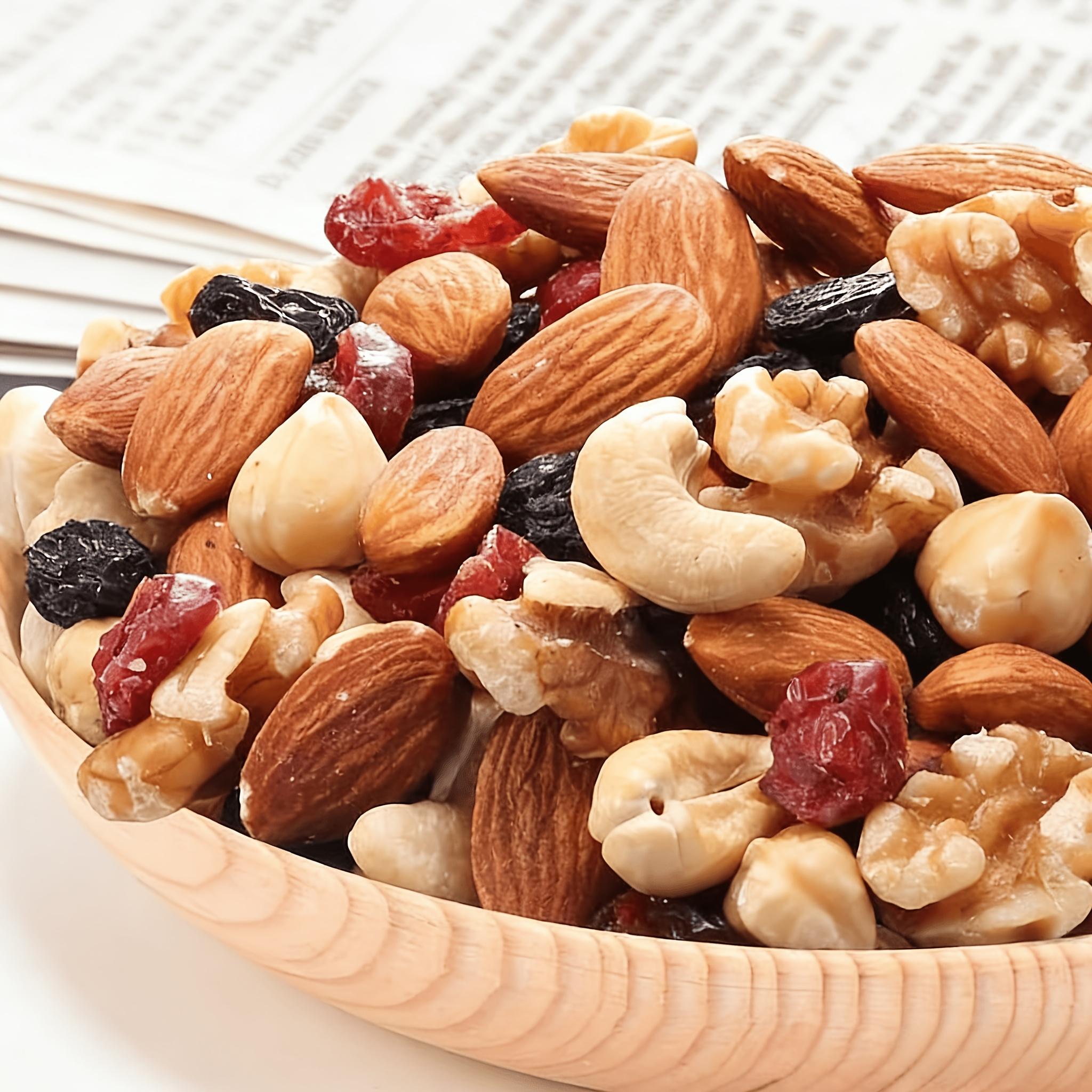 Mixed nut pieces (hazelnut, almond, cashews, walnut, dried grapes, dried cranberries); gluten-free snack; energy boost before and after workouts; low sugar, high protein; crunchy and tasty; individual small packaging for office snacks.