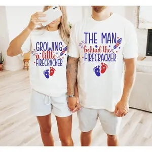 Growing A Little Firecracker Pregnancy Announcement 4th of July Couple Matching Shirts, The Man Behind The Firecracker Couple Tees, Expecting Parents Tee