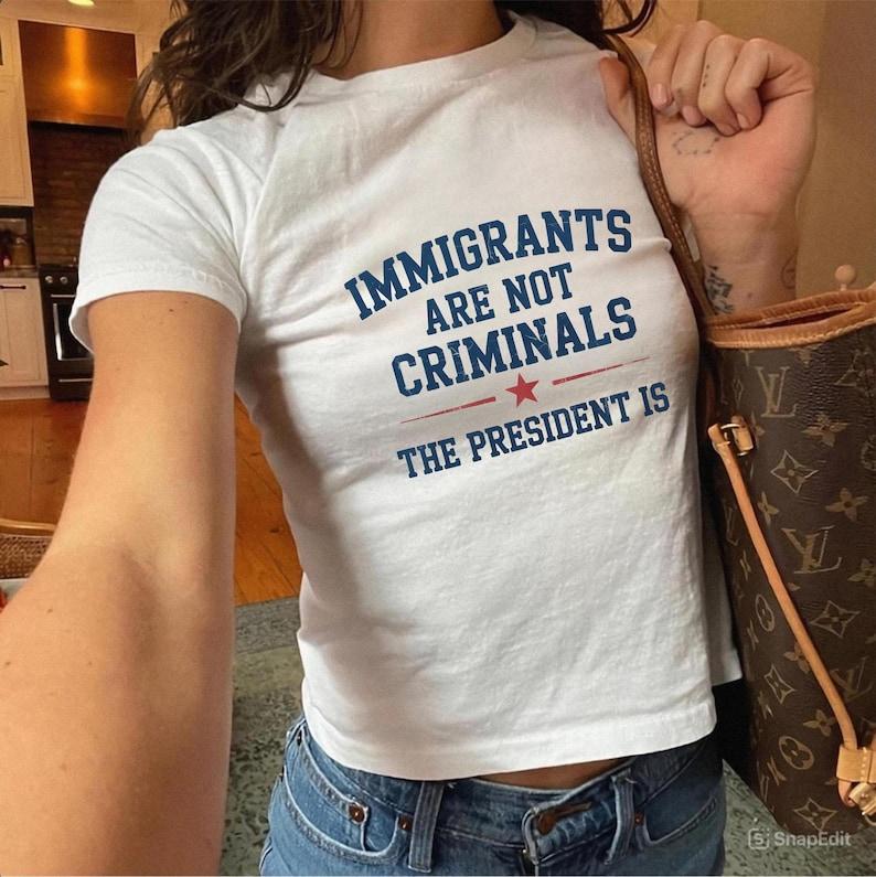 Pro Immigration Shirt Pro Immigrants Baby Tee President Criminal FDT Anti Trump Abolish Ice Protect Defend Latino Hispanic Political Protest