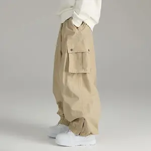 New style ski pants for men and women, elastic waist, casual solid color ski clothing, loose high street style snow pants, hip-hop style