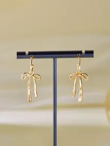 A pair of fashionable and elegant bow tie tassel dangle earrings, suitable for daily wear, vacation dates, and other occasions, and also a surprising and exquisite small gift
