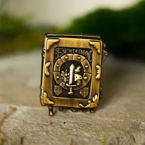 Enchiridion — Hero's Handbook Embossed Antique Adventure Enamel Pin Collectible
