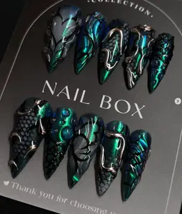 "Dragon scale chrome nails with emerald and sapphire hues, 3D metallic accents, and textured details—bold fantasy-inspired nails with a fierce vibe."