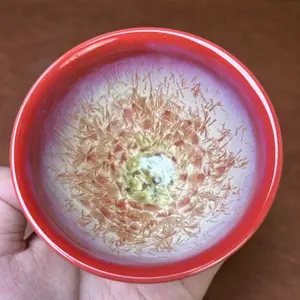 The kiln turns into golden branches and jade leaves, and the master cup is used to drink tea. Porcelain cup