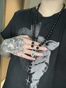 black bead rosary necklace, vibrant multicolor rosary, cross pendant necklace, new year gift idea, holiday gift for him/her, party favor accessory, elegant catholic jewelry, trendy rosary necklace, colorful prayer beads, spiritual gift for catholic