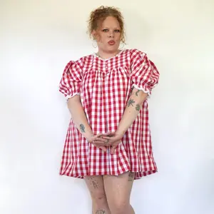 The Carolyn babydoll mini dress in red gingham The Carolyn babydoll mini dress in red gingham