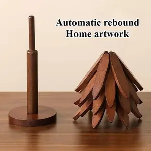 Foldable bamboo coaster set - can be transformed into a Christmas tree base, includes 4 walnut-colored coasters, suitable for placing hot dishes, pots, mugs, and bowls. Heat-resistant, space-saving, and a stylish kitchen decoration and ideal gift choice.