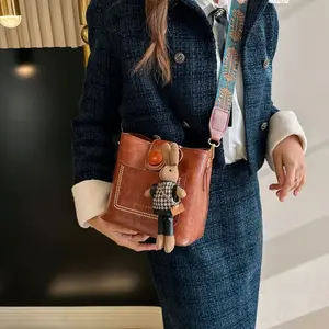 Trendy Bucket Crossbody Bag - Wide Strap Stylish Shoulder Purse for Fashion Lovers (with accessories)
