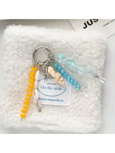 Simple and versatile bag accessory, fresh and creative ocean-themed bag charm, shell ornament keychain, blue ocean beaded phone chain, small gift