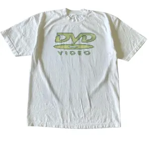 Retro DVD Video Graphic T-Shirt, Green And Yellow Distressed Digital Pixel DVD Video Disc Media Logo Icon Typographic Design, Unisex Streetwear Tee For Streetwear Fans, Vintage Nostalgia Outfit