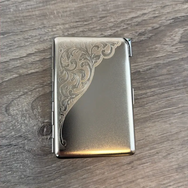 Designed Metal “Swirly Corner Design" Silver Case w/Built in Lighter