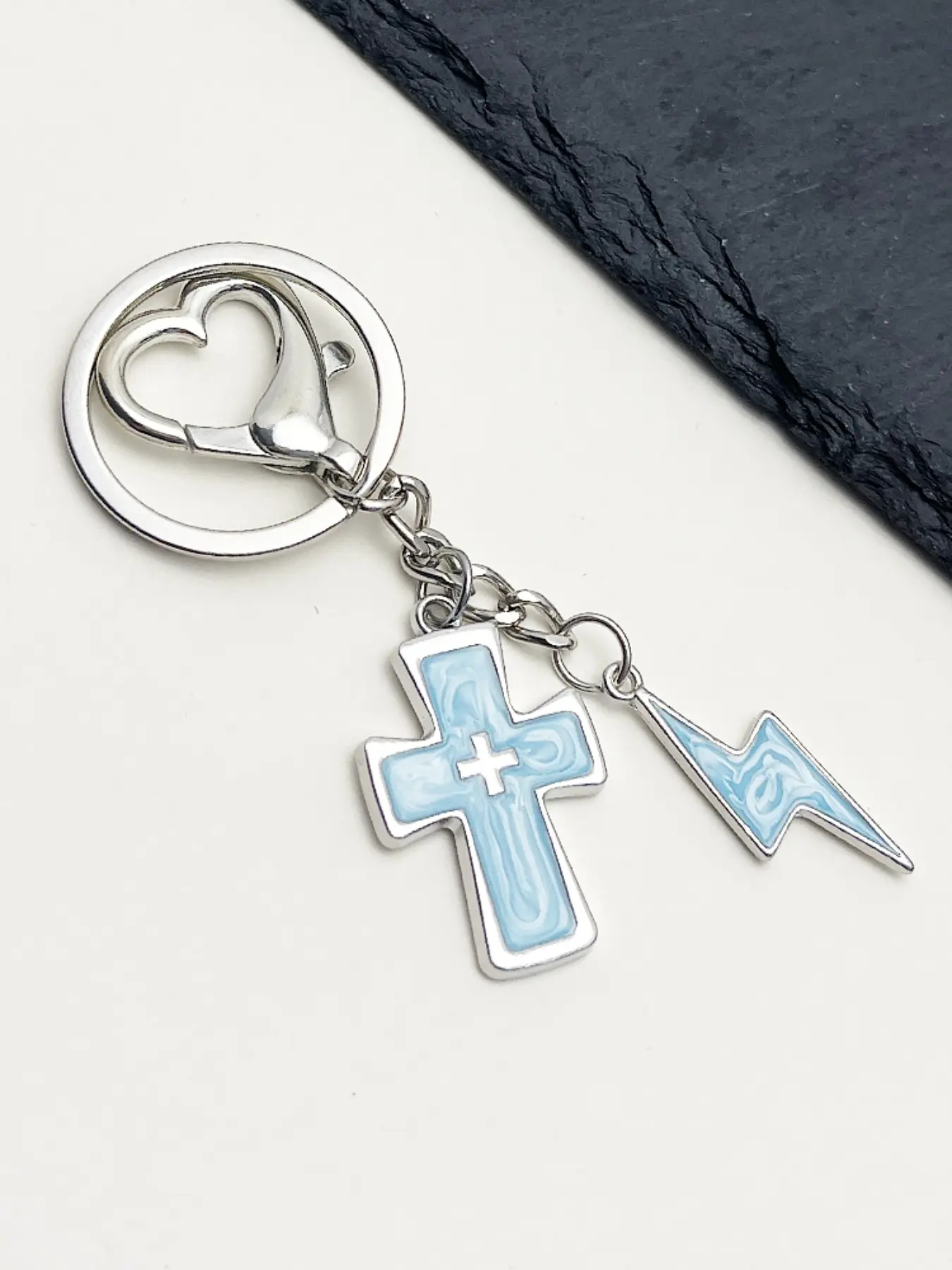 1 piece of new style keychain with cross lightning and heart shaped loops in pink white and blue suitable as a bag or car ornament