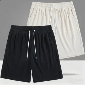 Men's casual shorts with a drawstring waistband for easy adjustment, featuring textured fabric that’s comfortable and not tight. Perfect for everyday wear with a simple T-shirt or trendy top.