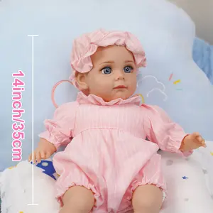 VACOS 14inch Reborn Baby Doll: Soft cotton body, pink striped outfit with delicate frills, lifelike blue eyes, and detailed body wrinkles. Perfect for birthdays, holidays, or a heartwarming gift!