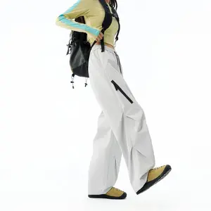 Men’s 2‑in‑1 waterproof softshell ski pants with fleece inner lining; windproof lightweight women’s wide‑leg sports pants for winter; breathable hiking/snowboarding joggers; softshell outdoor pants with zippered pockets