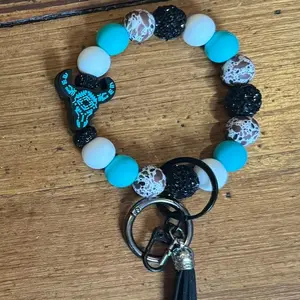 Western Keychain Wristlet comes with o-ring to easily attach to bag or purse. One size fits most.