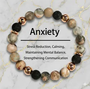 Unisex Bohemian-style matte marble & volcanic stone bracelet with rose gold beads. Minimalist, stress-relieving jewelry.