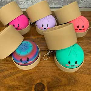 dumpling CLICKER toy with keychain and lid