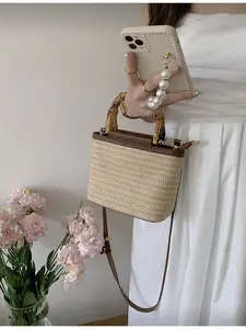 Handwoven Bamboo Handle Beach Bag Artistic Straw PU Leather Patchwork Tote Bag for Women Travel Summer Large Capacity Crossbody Handheld Storage Bag Fashion Crossbody Handbag