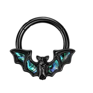 Bat hinge segmented ring with abalone shell wings