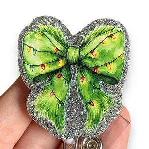 Glitter My Badge Christmas mean green bow with lights  nurse badge reel for nurse and hospital workers. Badge clip Badge pull - Retractable swivel clip with a 360 rotation. Great gift for coworker.