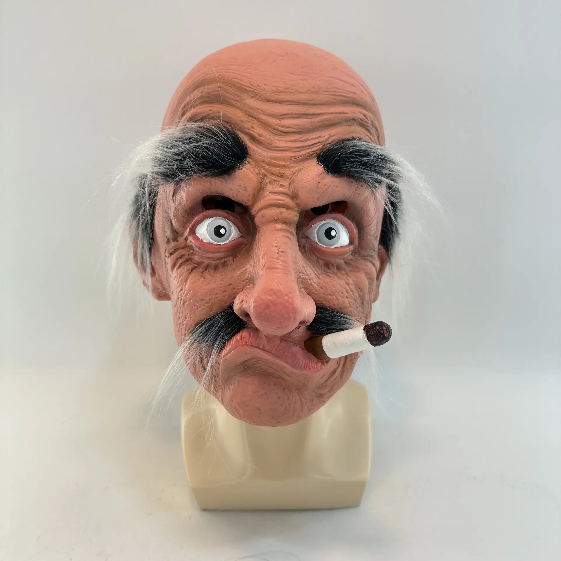 The old man with a flat mouth smoking a