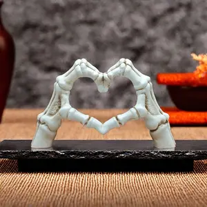 1pc Whimsical Skeleton Hand Resin Collectible Figurine with Unique Heart-Shaped Design, Spooky Love Tabletop Decor for Halloween & Day of the Dead, Durable and Easy to Clean for Indoor & Outdoor Use