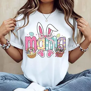 🐰💐[Graphic Tee]"Easter Bunny Mama T-Shirt – White Casual Tee with Bunny Ears, Basket & Paw Prints Graphic, Cute Mom Design, Spring Holiday Top, Easter Celebration Shirt, Soft Cotton Short Sleeve, Perfect Gift for Mothers & Women"