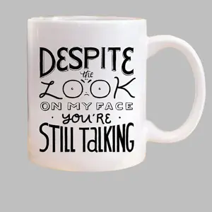 Bring on the Laughs! "Despite the Look on My Face, You're Still Talking" Coffee Mug
