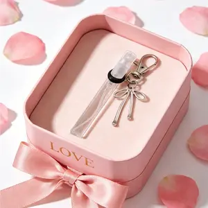 Mini Perfume Spray Bottle, Portable Refillable Scented Atomizer, Bow Keychain Charm, Travel Fragrance Accessory for Women