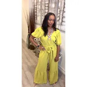 POSITIVE VIBES PLEATED & BELTED JUMPSUIT