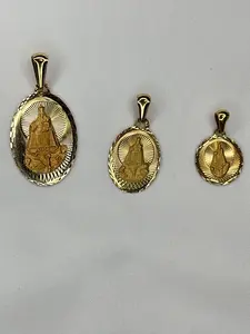 Dijes d la Virgen d la caridad en oro real 10k