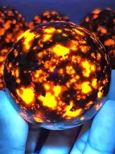 1pc Natural Yooperlite Flame Stone Natural Crystal Sphere - Reactive Glow-in-the-Dark, Genuine Sodalite Mineral Sphere with Glowing Flame Patterns, Deep Blue, Black, Golden, Orange, Yellow Colors - Home Decor, Christmas, Halloween, Birthday, Anniversar
