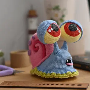 Giant-Eyed Crochet Snail Plushie – Whimsical Handmade Toy for Kids, Teens & Craft Lovers