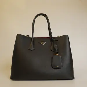 Pre-owned PRADA Double Bag in Black and Gold Calfskin Large Handbag with Inverted Triangle Logo Red Color Blocking Accent Cross Grain Leather
