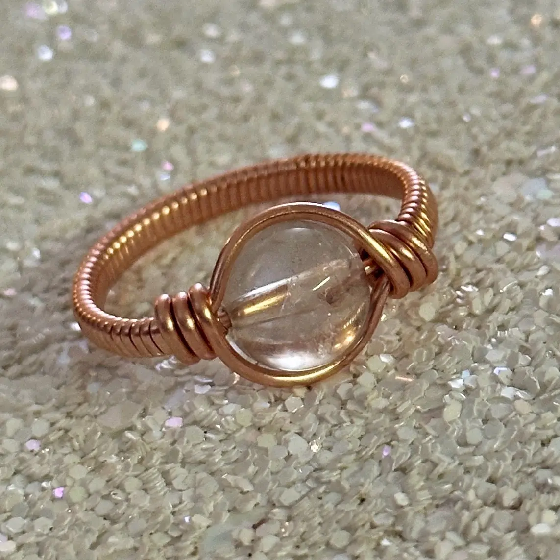 Clear Quartz Crystal and Copper Ring - Elegant Design with Smooth Finish and Simple Band