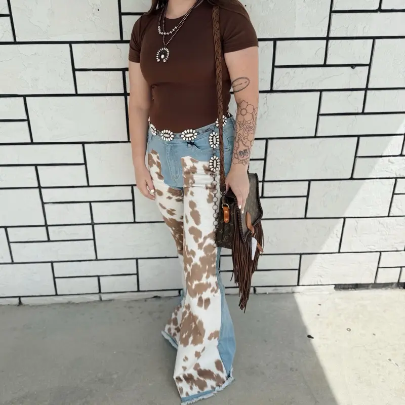 Cowprint Flared Jeans with Distressed Look and Fringe Detail for Women's Fashion