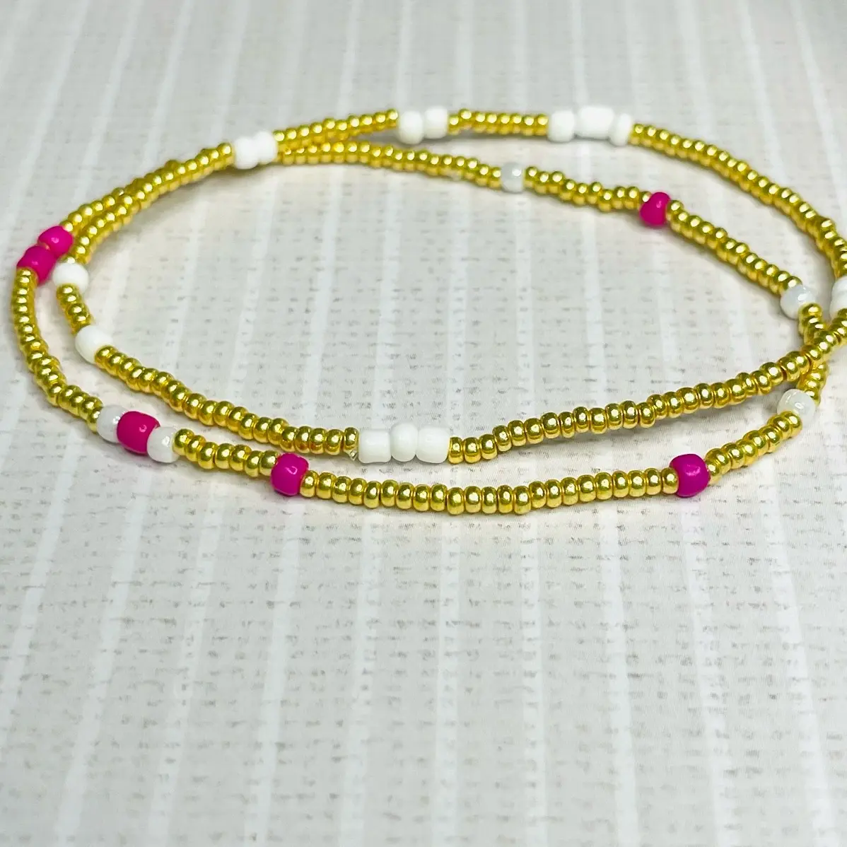 Dainty beaded gold and white or pink bracelets set of 2