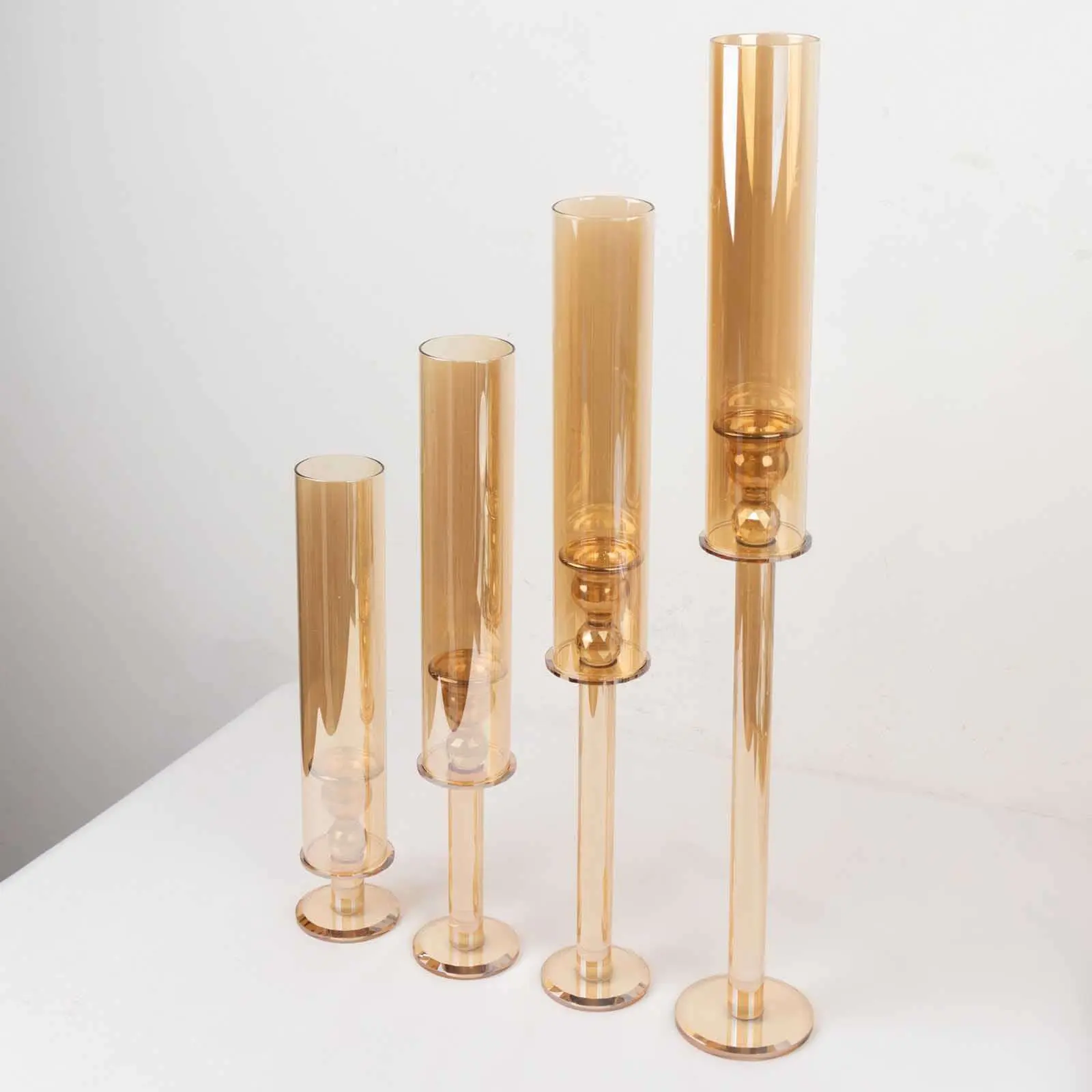 4-Pack Multi-Size Tapered Crystal Glass Hurricane Candle Holders - 14in, 18in, 22in, 26in Tall Amber Gold Cylinder Chimney Stands, Home Supplies Tabletop Decor for Weddings, Homes, Four Pack