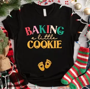 Baking A Little Cookie Pregnancy Announcement T-Shirt, Sweatshirt, Hoodie - Christmas Pregnant Sweatshirt, Pregnancy Reveal, Christmas Gift For Mom-To-be, Maternity Christmas T-shirt