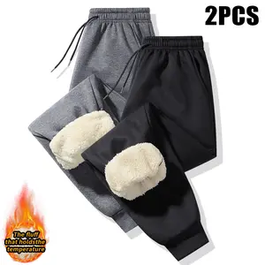 Men's 2-pack regular fit solid color warm sherpa-lined sweatpants, perfect for autumn and winter wear. Made with thick fleece lining, these casual street-style comfortable pants keep you warm and cozy.