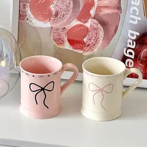 2pcs Ins-style Couple Ceramic Mugs with Bow Design Double-sided Printed in Cream White & Blush Pink Heat-insulated Reusable Premium Ceramic Ideal for Coffee Tea Milk & More Home Office Travel Decorative Classic Stylish Novelty Gift - Set, Drinkware