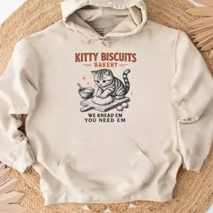 Kitty Biscuits Bakery Hoodie – Cute Cat Baking Pun “We Knead Em You Need Em” Cozy Cat Lover Sweatshirt