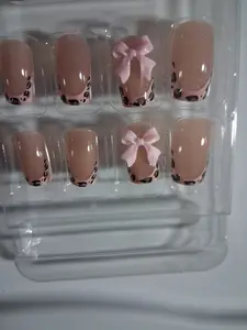 Black and Light Pink bowbtie cheetah nails
