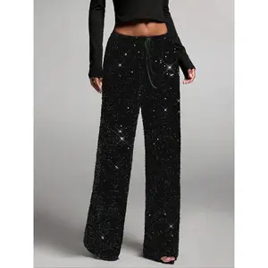 Women’s fashionable pants with an elastic waistband, bow design, and sequin details—stylish casual trousers